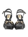 BLACK SANDALS WITH GOLDEN JEWEL ACCESSORY